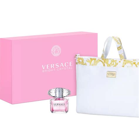 versace perfume set with bag.